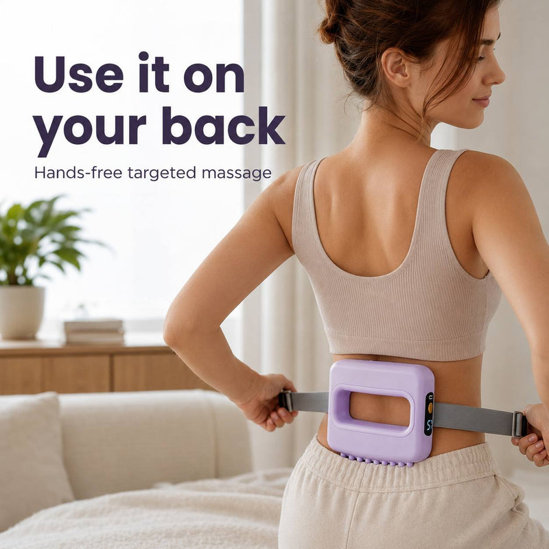 Woman using the purple Kindura Fascia Recovery Ring hands-free on her lower back for targeted muscle relief